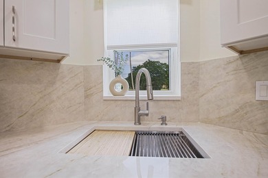 WELCOME TO THIS VERY DESIRABLE CORNER CONDO WITH BEAUTIFUL WATER - photo 8