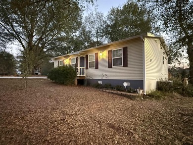 Discover comfort, convenience, and peaceful country living in