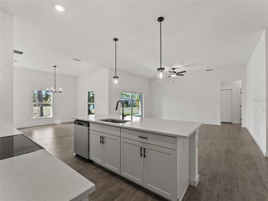 Tile throughout. Quartz countertops. Impact windows. Paver - photo 6