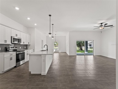 Tile throughout. Quartz countertops. Impact windows. Paver - photo 8