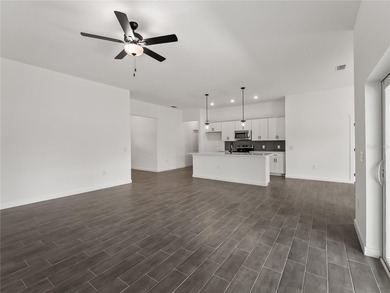 Tile throughout. Quartz countertops. Impact windows. Paver - photo 9