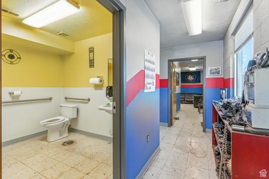 This well-maintained automotive shop offers a rare opportunity - photo 8