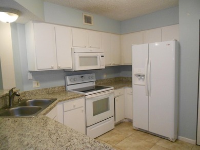 This 3-bedroom, 2-bath home includes a detached garage. Step - photo 1