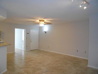 This 3-bedroom, 2-bath home includes a detached garage. Step - photo 2
