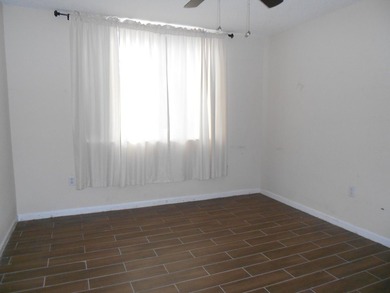 This 3-bedroom, 2-bath home includes a detached garage. Step - photo 8