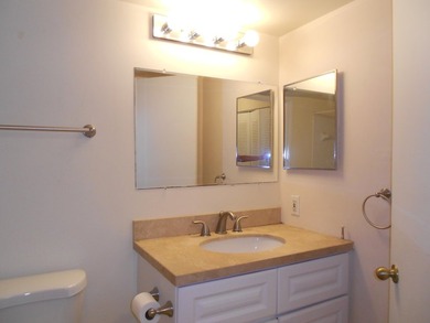 This 3-bedroom, 2-bath home includes a detached garage. Step - photo 10