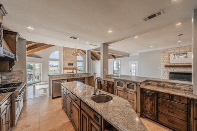 Welcome home to this magnificent estate nestled within the gated - photo 14