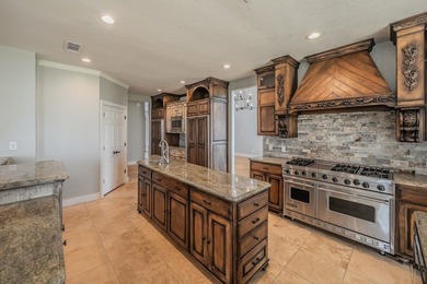 Welcome home to this magnificent estate nestled within the gated - photo 16