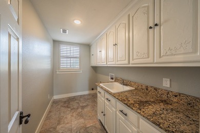 Welcome home to this magnificent estate nestled within the gated - photo 21