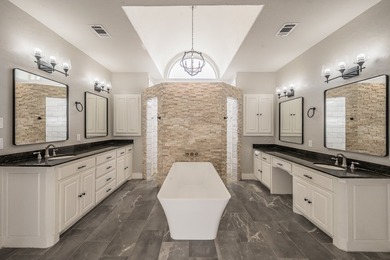 Welcome home to this magnificent estate nestled within the gated - photo 31