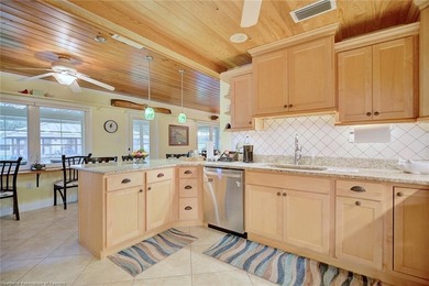 This recently remodeled and beautifully appointed canal front - photo 10