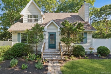 Welcome to this beautifully maintained 4-bedroom, 2-bathroom - photo 1