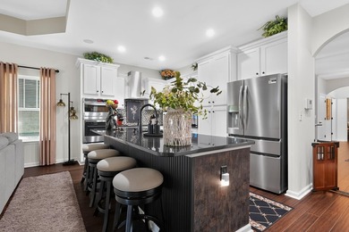 Nestled within the prestigious Preserve at Green Lakes in the - photo 9