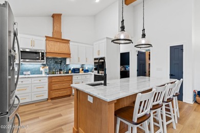 Welcome to 7605 East Yacht Drive NE in Oak Island, North