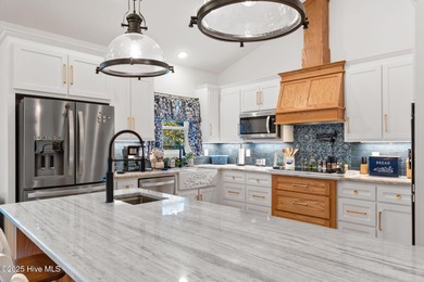 Welcome to 7605 East Yacht Drive NE in Oak Island, North