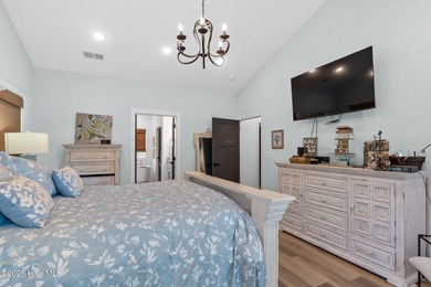 Welcome to 7605 East Yacht Drive NE in Oak Island, North