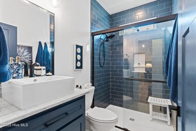 Welcome to 7605 East Yacht Drive NE in Oak Island, North