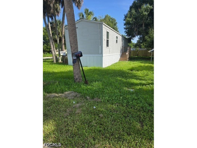 2018 manufactured home situated on a corner lot featuring 2 - photo 1