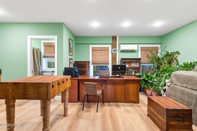 Welcome to 7605 East Yacht Drive NE in Oak Island, North