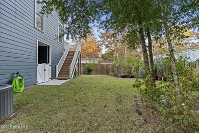 Welcome to 7605 East Yacht Drive NE in Oak Island, North