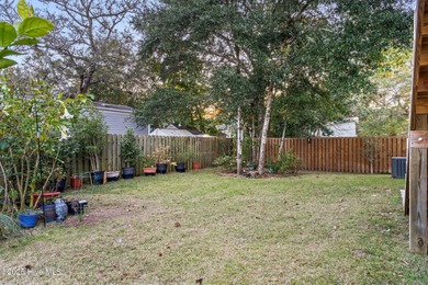 Welcome to 7605 East Yacht Drive NE in Oak Island, North