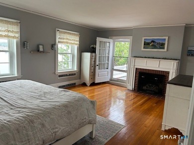 Tucked away on a quiet cul-de-sac on the western shore of the - photo 24