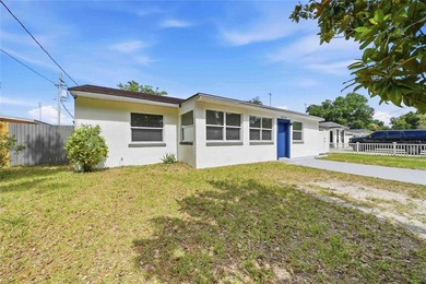IMPROVED PRICE!!! Welcome to this recently renovated solid block - photo 2