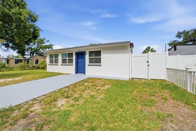 IMPROVED PRICE!!! Welcome to this recently renovated solid block - photo 3
