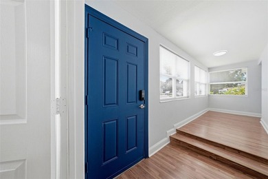 IMPROVED PRICE!!! Welcome to this recently renovated solid block - photo 4