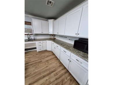 Charming and well maintained 2 bedroom, 2 bathroom home designed - photo 11
