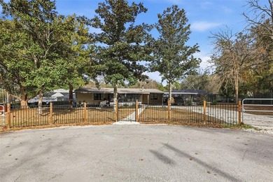 Set on just over half an acre, this 1989 double-wide mobile home - photo 2
