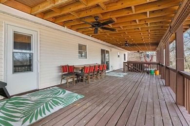 Experience true lakefront living on Table Rock Lake, just - photo 5