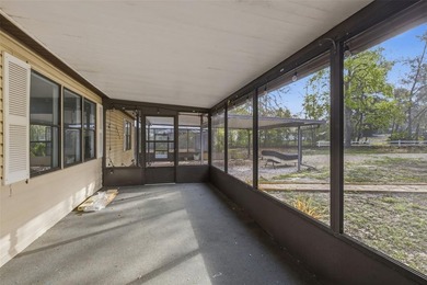 Set on just over half an acre, this 1989 double-wide mobile home - photo 5
