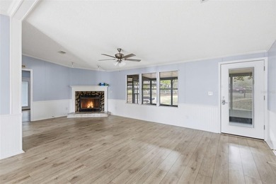 Set on just over half an acre, this 1989 double-wide mobile home - photo 6
