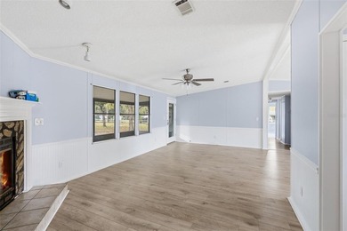 Set on just over half an acre, this 1989 double-wide mobile home - photo 7