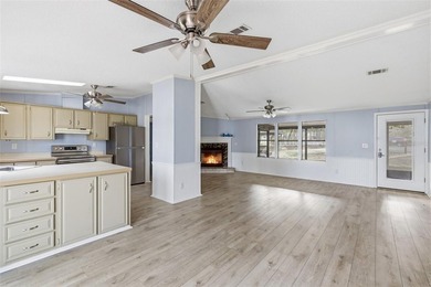 Set on just over half an acre, this 1989 double-wide mobile home - photo 8