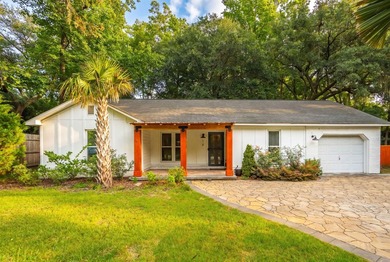 Discover this wonderful three-bedroom, two-bathroom brick ranch - photo 1
