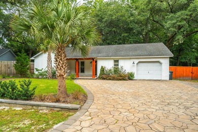 Discover this wonderful three-bedroom, two-bathroom brick ranch - photo 3