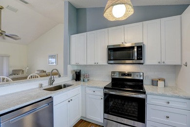TURNKEY,FULLY FURNISHED 2BR/2BA with stunning lake and golf - photo 17