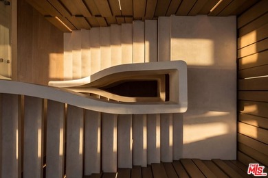 A dual-entry motor court paved in stone sets the stage for - photo 19