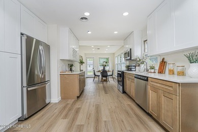 Completely remodeled and beautifully reimagined, this stunning - photo 9