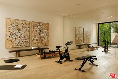 A dual-entry motor court paved in stone sets the stage for - photo 22
