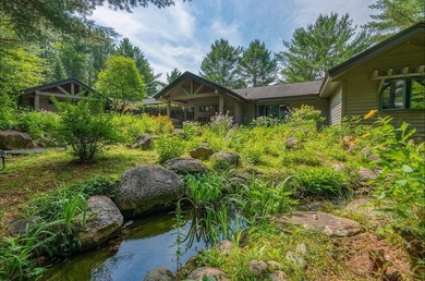 This luxury 4BR/3BA custom estate near Land O'Lakes sits on 14 - photo 3