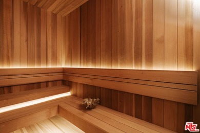 A dual-entry motor court paved in stone sets the stage for - photo 24