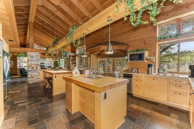 This luxury 4BR/3BA custom estate near Land O'Lakes sits on 14 - photo 9