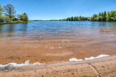 Stunning waterfront home on the shores of Big Lake, featuring - photo 3