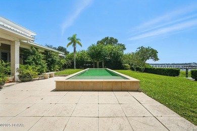 Experience luxurious riverfront living in this striking - photo 5