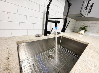 Virtually Staged. FULLY RENOVATED FIRST-FLOOR CONDO IN HIGHLY - photo 6