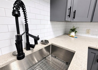 Virtually Staged. FULLY RENOVATED FIRST-FLOOR CONDO IN HIGHLY - photo 7