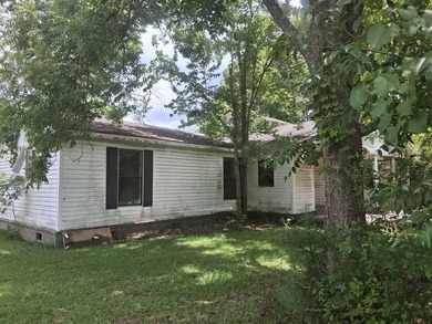 This 4 bedroom 2 bath home is sold AS-IS without appliance and - photo 2